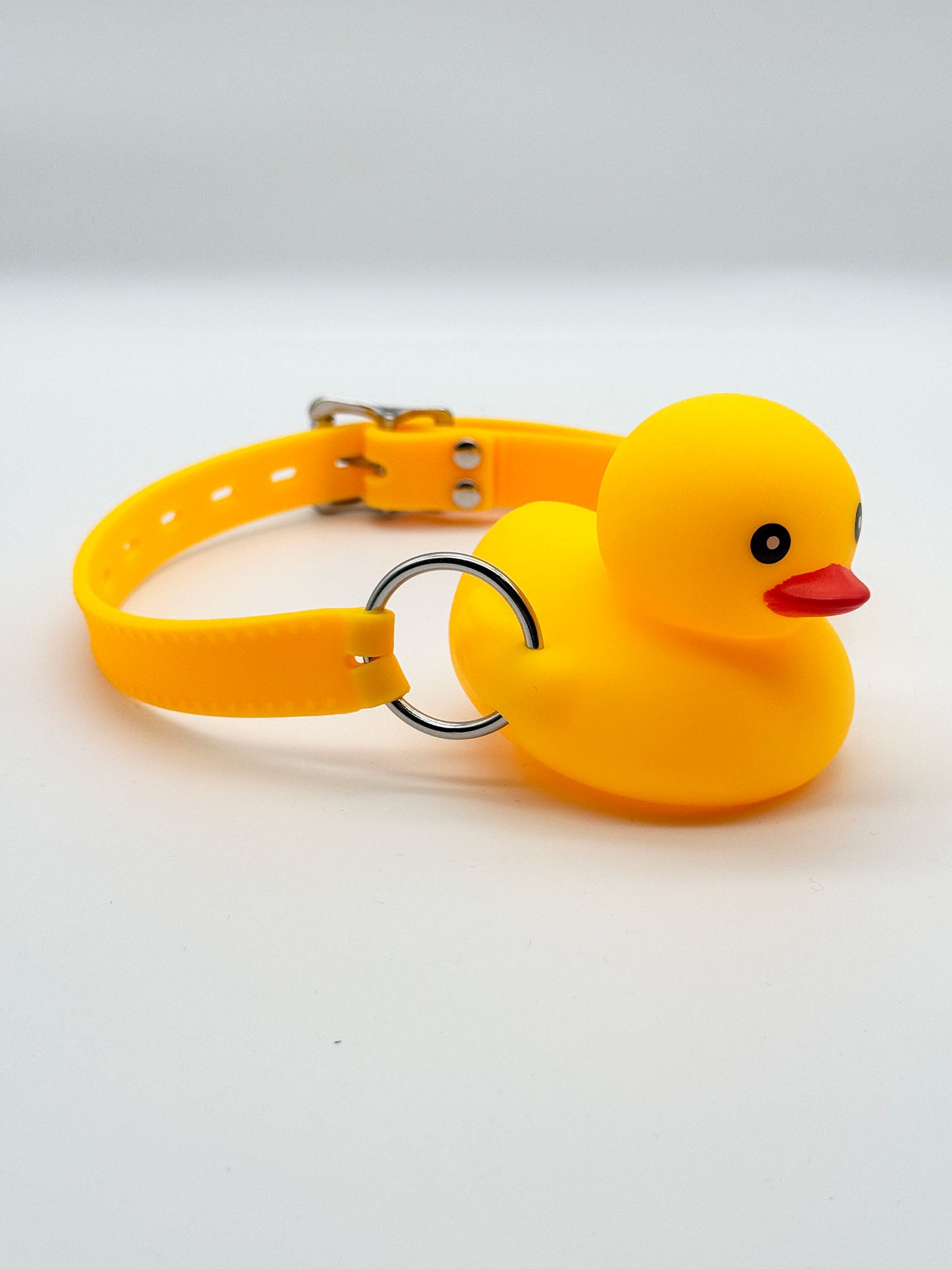 LOCKING SILICONE RUBBER DUCKY GAG YELLOW STRAP EDITION FRONT - FullKit.com